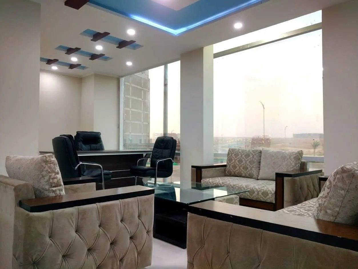 Hotel lobby renovation with reception desk and wall cladding