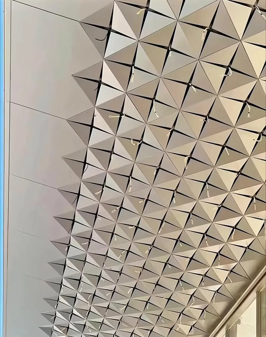 Open plan office fit-out in Muscat with ceiling grids and glass partitions